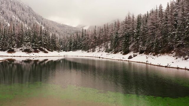 A drone shot of Green Lake in Austrian Alps. Aerial view of winter landscape of gruner see lake in Styria.