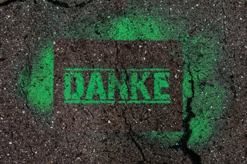 Danke Graffito Asphalt Text