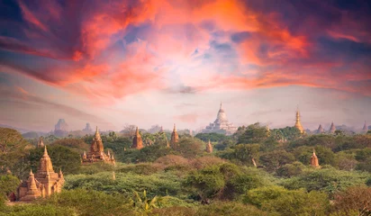 Fotobehang View from above, stunning aerial view of the Bagan Archaeological Zone during a beautiful sunset. Bagan is an ancient city and a Unesco World Heritage Site located in Myanmar. © Travel Wild