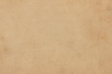 The surface of the old worn faded cardboard is stained.