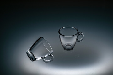 glassware for tea mulled wine coffee illuminated by light from below on frosted glass