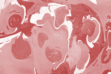 Red marble ink texture on watercolor paper background. Marble stone image. Bath bomb effect. Psychedelic biomorphic art.