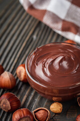 toasts with chocolate butter on a dark wooden rustic background
