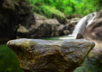 empty stone for product display in nature with waterfall. Free space for product announcements