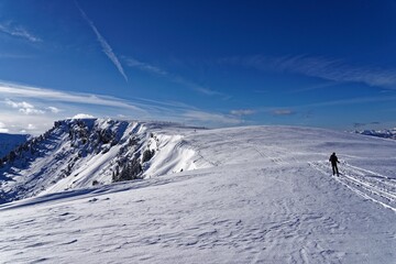 skiing in the mountains