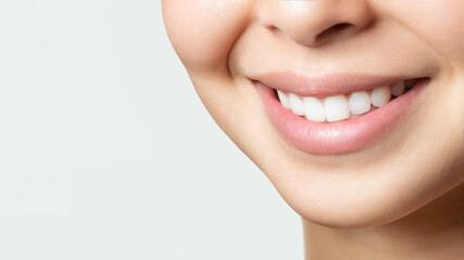 Perfect healthy teeth smile of a young asian woman. Teeth whitening. Dental clinic patient. Image symbolizes oral care dentistry, stomatology. Dentistry image