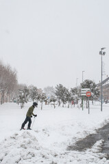 Person making ski in the town during the "Filomena" storm.