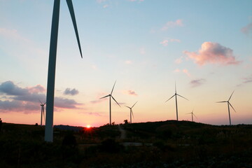 Obraz premium Silhouette of the wind turbine sunrise , Dan Khao Kho,Phetchabun, Thailand.