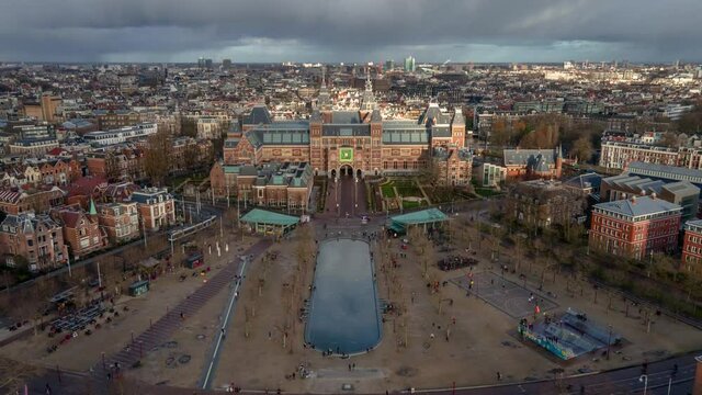 Rijksmuseum Amsterdam in The Netherlands aerial drone view timelapse hyperlapse of a sunny winter day.