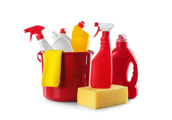 Plastic bucket and different cleaning supplies on white background