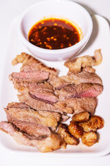 Thai style grilled beef with spicy sauce.