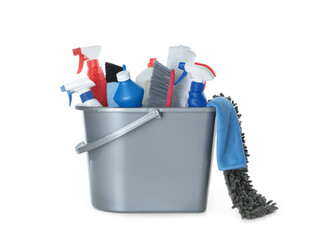 Plastic bucket with different cleaning supplies on white background