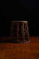 Vintage rattan chairs on wooden background