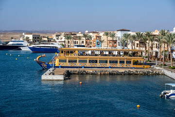 Fototapeta na wymiar fragments from the life of the local port from which diving boats leave for the Red Sea on safari