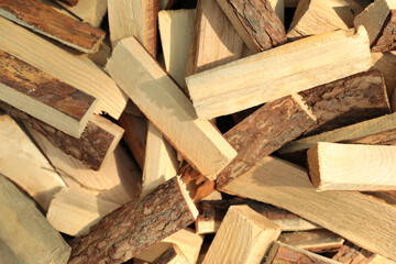 Pile of cut firewood as background, top view