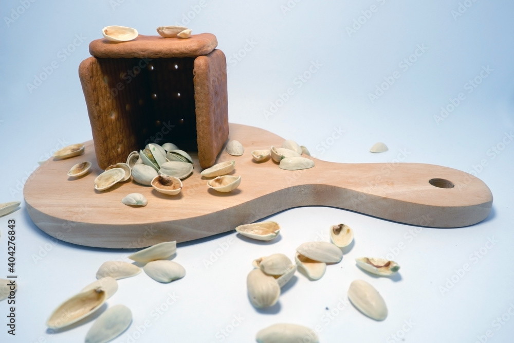 Wall mural some biscuits and beans in wood tray