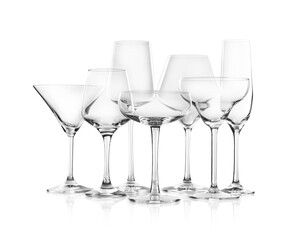 Set of new bar glassware on white background