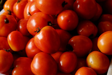 Group of Tomatoes in Market