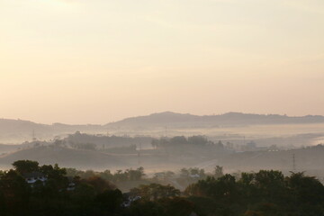 The scenery on the top of the mountain in the morning, mountain peaks in morning fog,Thailand.	