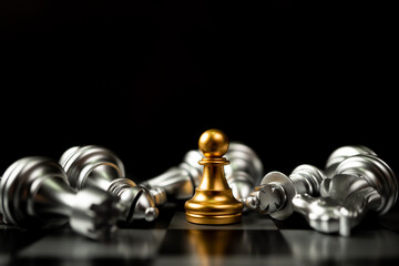 Golden Chess pawn is last standing in the chess board, Concept of successful business leadership,...