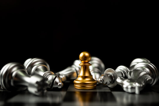 Golden Chess pawn is last standing in the chess board, Concept of successful business leadership, business vision for a win in business games