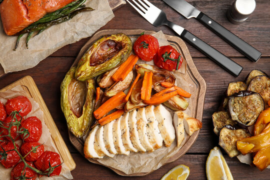 Tasty Cooked Chicken Fillet And Vegetables Served On Wooden Table, Flat Lay. Healthy Meals From Air Fryer