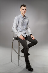 Young businessman sitting on a chair