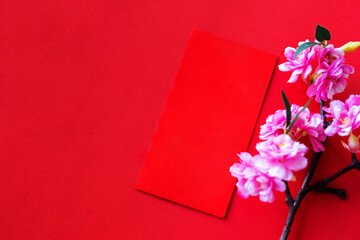 Red envelope put on red background, red envelope is gift,  blossom on special days such as chinese new year,