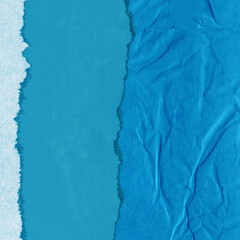 Blue torn paper collage close-up. Texture made from various paper and cardboard parts. Damaged old paper background. Vintage blank wallpaper. Material design backdrop.