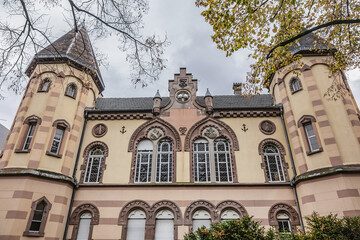 Fragments of old building of Circle Catholic Saint-Martin, created in 1880 - 72-meter-long building combines neo-Romanesque and neo-gothic styles. Colmar, Alsace, France.
