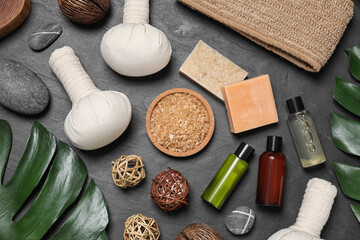 Flat lay composition with spa products on grey background