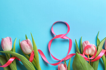 8 March card design with tulips on light blue background, flat lay. International Women's Day