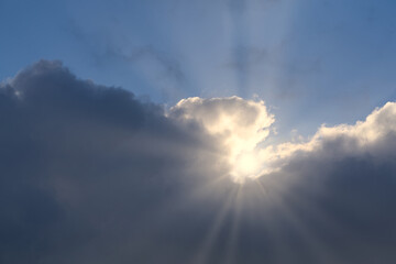 Naklejka na ściany i meble beautiful clouds with blue sky and sun rays