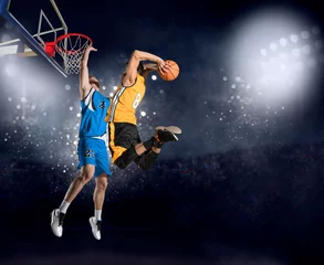 Fotobehang Two basketball players in arena. Blocked shot © Andrey Burmakin