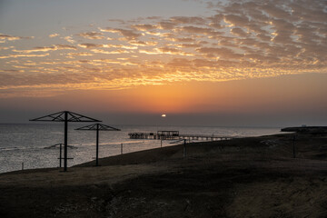 Fototapeta na wymiar sunrise over the beach coastline in December in Egypt
