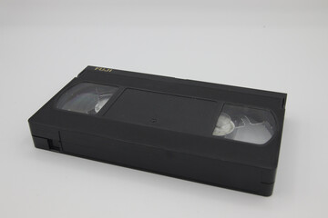 In the foreground a staircase made from old VHS. In the 80s they were used for watching movies, through the internal film.