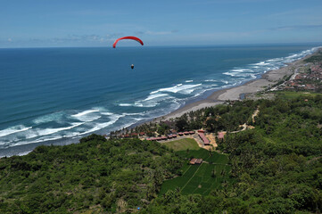 paraglider over the sea
