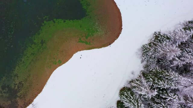 Aerial shot from above of Green Lake in Austrian Alps. Aerial view of winter landscape of gruner see lake in Styria.