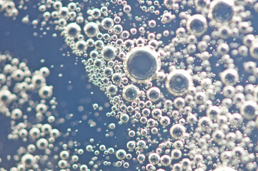 Bubbles from soda water or champagne, beer or other liquid with air, oxygen or carbon dioxide...