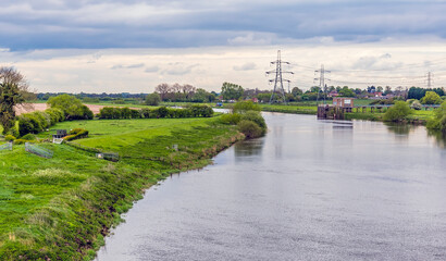 Fototapeta na wymiar A view across the River Trent from the abandoned railway viaduct at Fledborough, Nottinghamshire in springtime