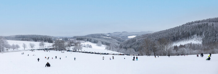 Panorama of snowy landscape in winter in Germany.