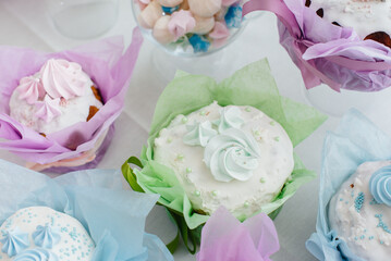 Beautiful Easter cakes on a decorated light table. A light holiday of Easter.