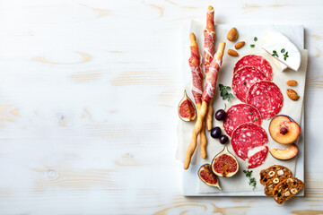 Appetizers table with italian antipasti snacks. Brushetta or authentic traditional spanish tapas...