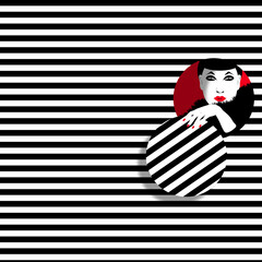 A woman peeks through a hole in a striped pattern.