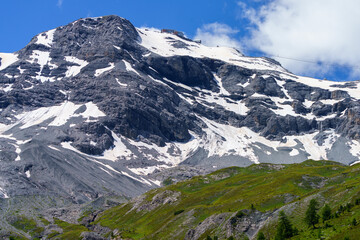Mountain landscape along the road to Stelvio pass at summer. Glacier