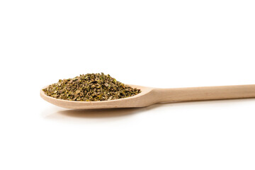 Oregano spice in wooden spoon isolated.