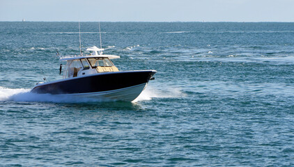 Fishing boat returning to Port of Miami after a day at sea.