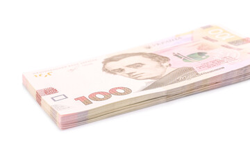 Obraz na płótnie Canvas 100 Ukrainian Hryvnia banknotes on white background