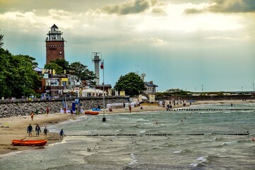 lighthouse on the beach - obrazy, fototapety, plakaty