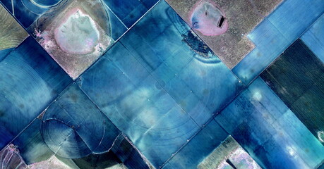the shapes of water,  United States, abstract photography of relief drawings in  fields in the...
